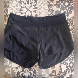 lululemon black speed up mid rise lined short 4 in size 10